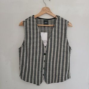 Black and white knit vest